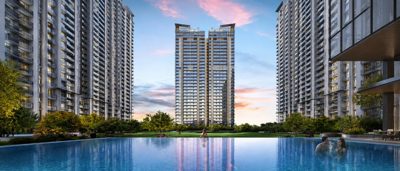 M3M Golf Hills luxury residential towers overlooking landscaped gardens and a scenic water feature in Gurgaon